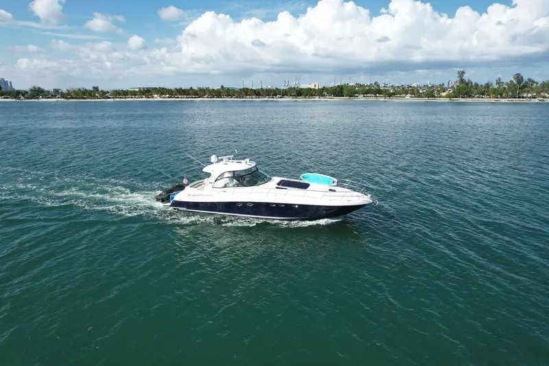 Slide: The Image of 2004 Sea Ray 500 Sundancer cruising on a sunny day. - 30