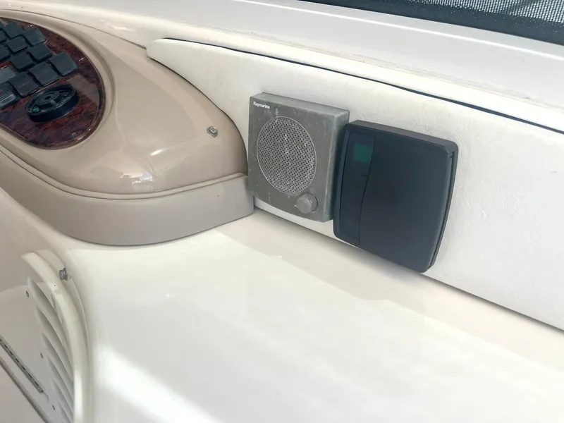 Slide: The Image of Close-up of 2004 Sea Ray 500 Sundancer dashboard with speaker and control panel. - 39