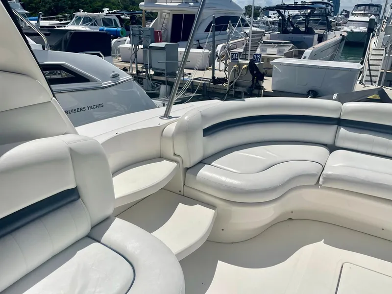 Slide: The Image of Luxurious 2004 Sea Ray 500 Sundancer yacht with spacious white seating area. - 41