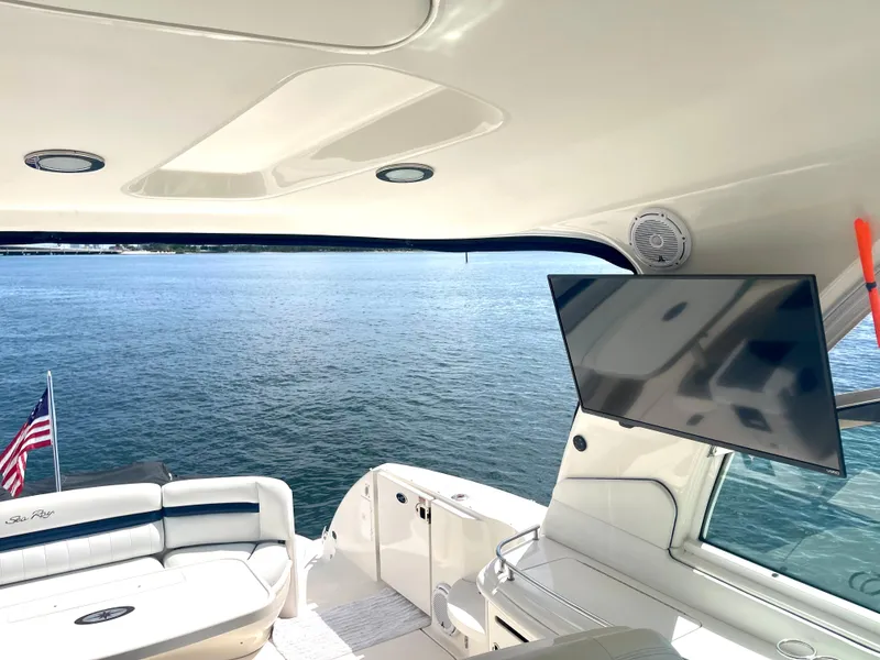 Slide: The Image of Interior view of 2004 Sea Ray 500 Sundancer yacht with water in the background. - 50