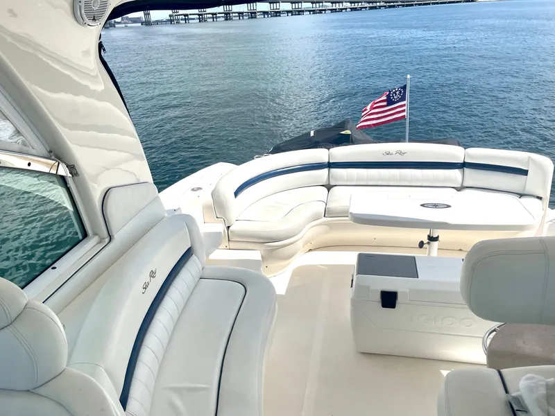 Slide: The Image of 2004 Sea Ray 500 Sundancer yacht with spacious seating and ocean view. - 52
