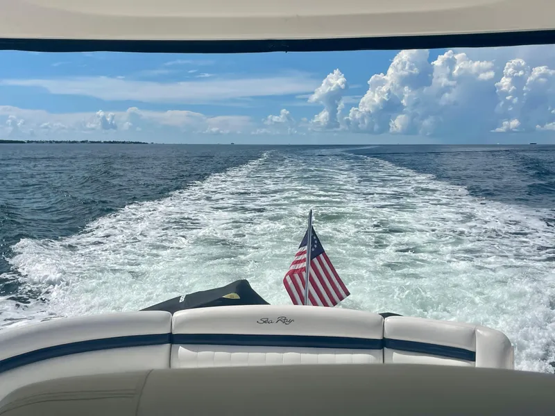 Slide: The Image of View from a 2004 Sea Ray 500 Sundancer cruising on open water. - 53