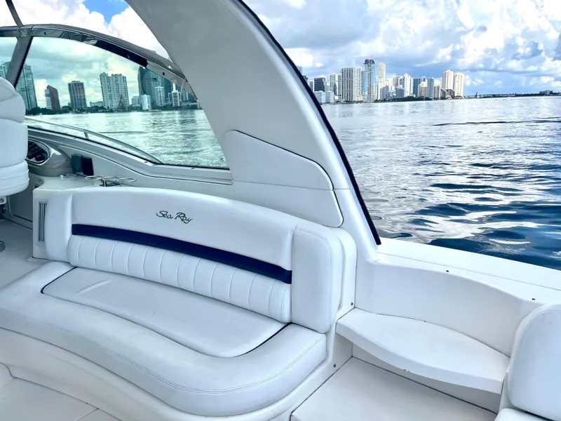 Slide: The Image of 2004 Sea Ray 500 Sundancer interior with city skyline in the background. - 56