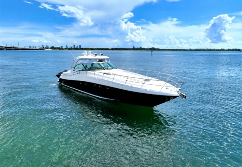 Slide: The Image of 2004 Sea Ray 500 Sundancer yacht cruising on a sunny day. - 7