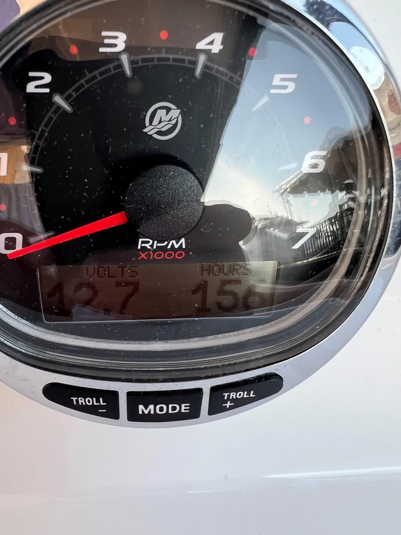 Slide: The Image of Close-up of a 2020 Protector 330 Targa tachometer displaying RPM and engine hours. - 14