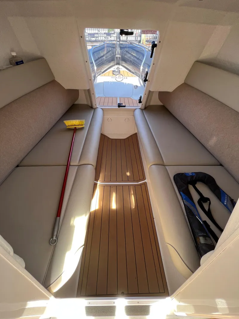 Slide: The Image of Interior of 2020 Protector 330 Targa boat with seating and wooden flooring. - 21
