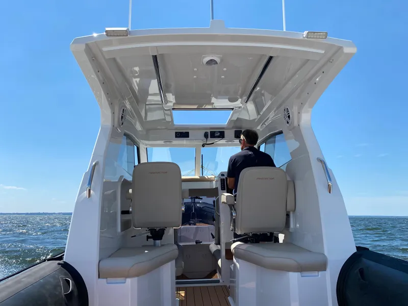 Slide: The Image of 2020 Protector 330 Targa boat interior with ocean view. - 29