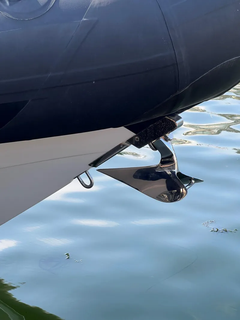 Slide: The Image of Protector 330 Targa 2020 boat anchor detail on calm water. - 9