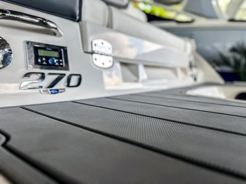 Slide: The Image of 2025 Chaparral 270 OSX OB boat interior with sleek design and modern features. - 7