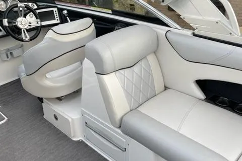 Slide: The Image of 2015 MasterCraft X-55 boat interior with luxurious white and gray seating. - 3