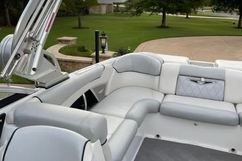 Slide: The Image of 2015 MasterCraft X-55 boat interior with luxurious seating and modern design. - 7