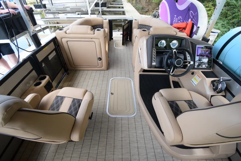 Slide: The Image of 2022 Barletta Lusso 23UC interior with luxurious seating and modern dashboard. - 21
