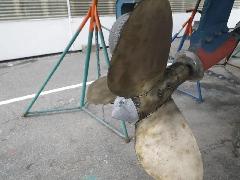 Slide: The Image of Propeller of 1981 Southern Cross 39' sailboat on a stand, close-up view. - 36