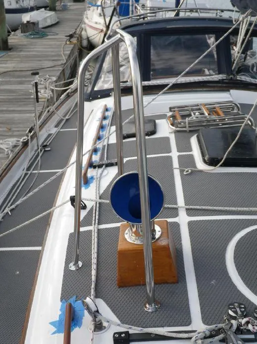 Slide: The Image of 1981 Southern Cross 39' yacht deck with stainless steel railings and blue winch. - 8