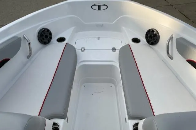 Slide: The Image of 2023 Tahoe 210 Si boat interior with gray and red seating. - 5
