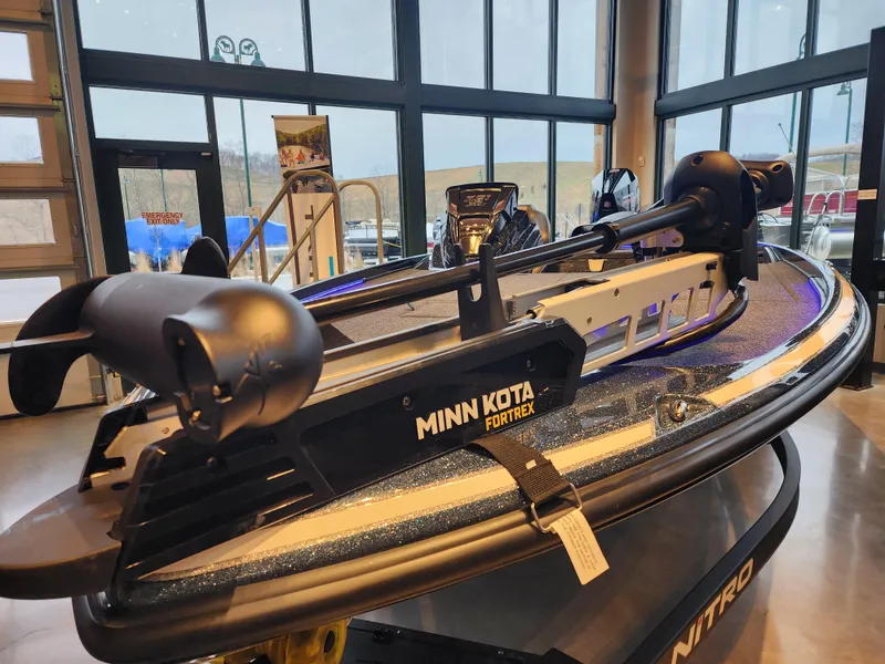Slide: The Image of 2023 Nitro Z21 XL boat with Minn Kota Fortrex motor in showroom. - 4
