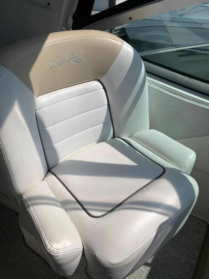 Slide: The Image of Luxurious white leather seat on 2008 Sea Ray 330 Sundancer boat. - 12