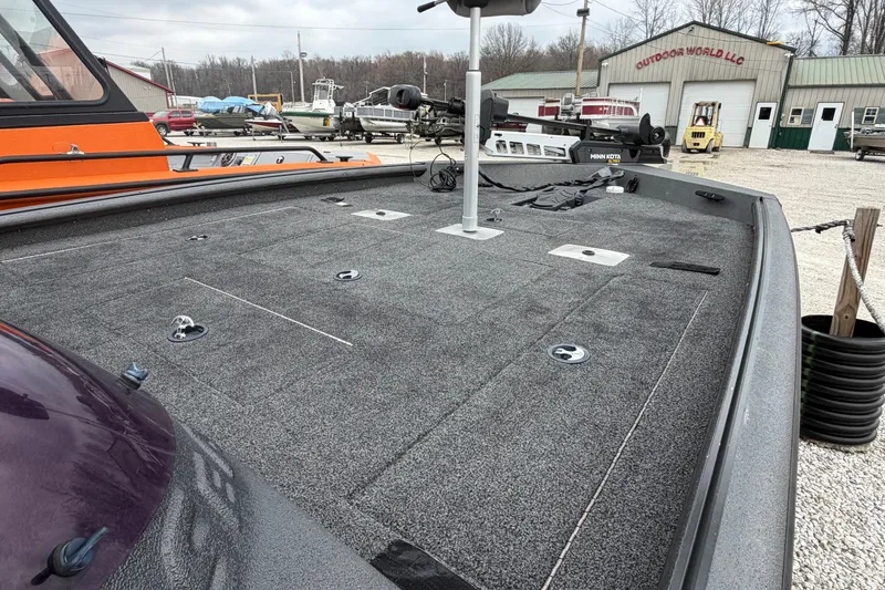 Slide: The Image of 2022 SeaArk Stealth 210 boat deck at Outdoor World LLC dealership. - 10