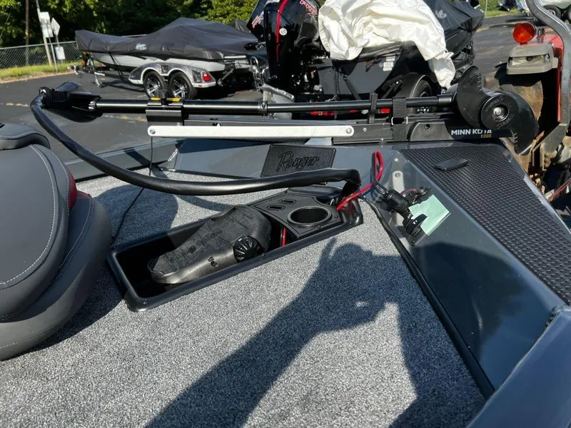 Slide: The Image of 2023 Ranger RT178 boat deck with Minn Kota trolling motor and storage compartment. - 4