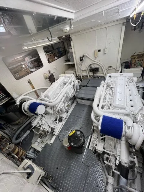 Slide: The Image of Engine room of a 1987 Marine Trader 62 Med Yacht with twin engines. - 11