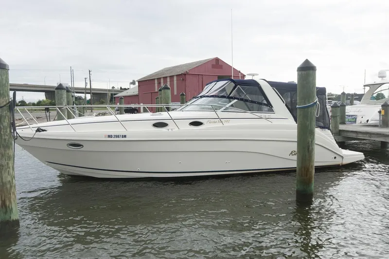The Image of 2002 Rinker 342 Fiesta Vee boat docked at marina. - 0