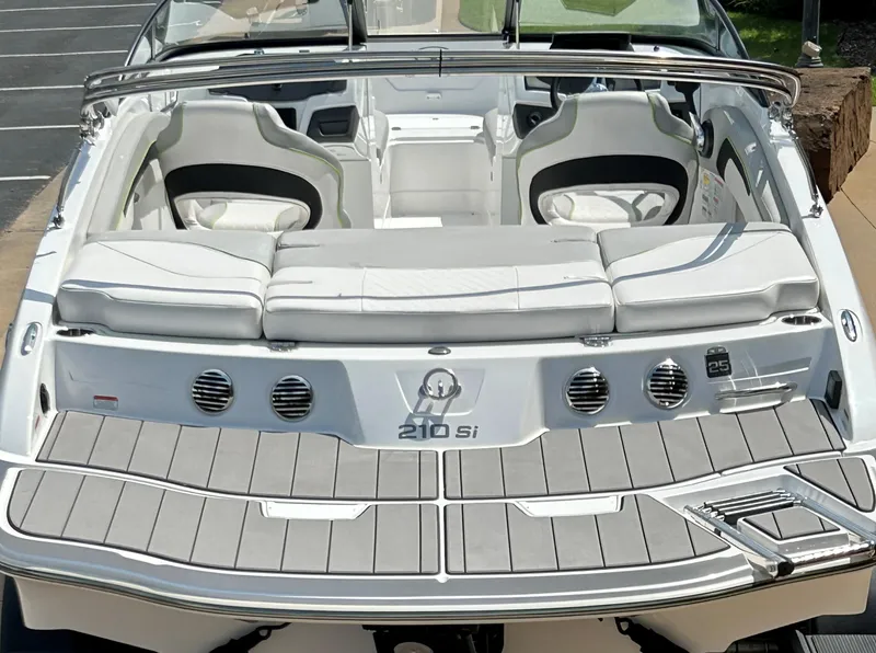 Slide: The Image of 2023 Tahoe 210 Si boat with spacious seating and modern design. - 2