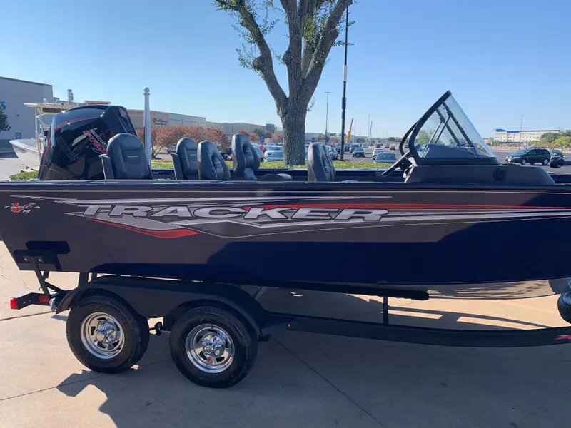 The Image of 2023 Tracker Targa V-19 WT boat on trailer, parked outdoors. - 0