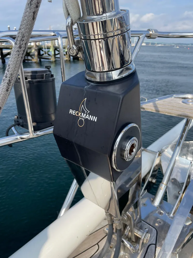 Slide: The Image of Reckmann sailboat equipment on 1992 Nautor Swan 68, docked by the sea. - 11