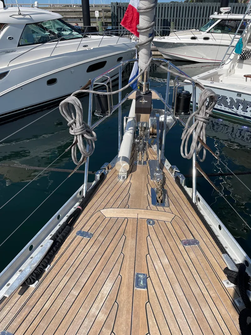 Slide: The Image of Bow deck of a 1992 Nautor Swan 68 yacht docked at a marina. - 7