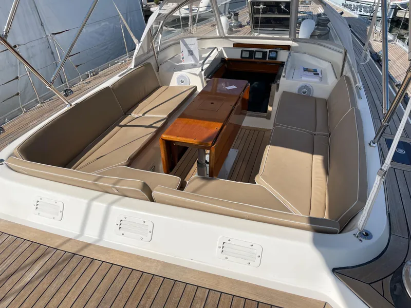 Slide: The Image of 1992 Nautor Swan 68 yacht with spacious cockpit and beige seating - 9