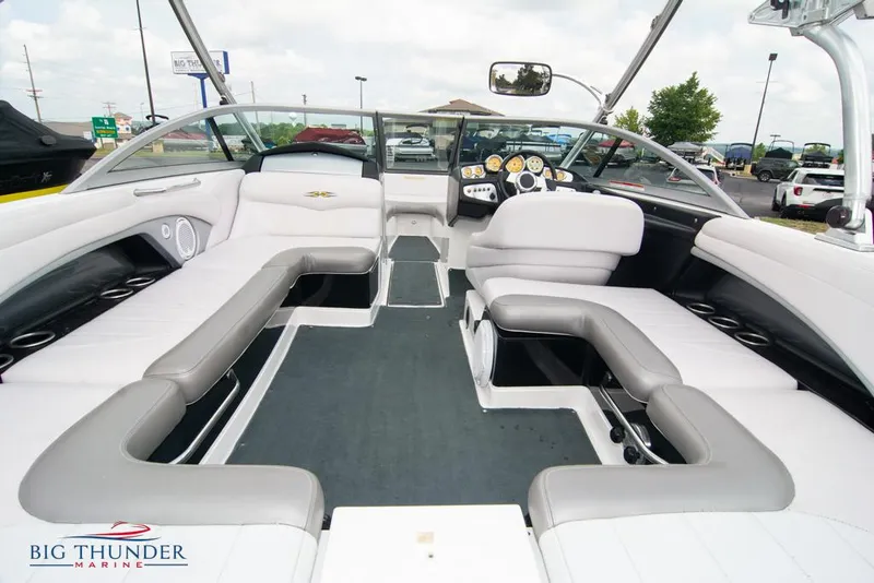 Slide: The Image of 2005 MasterCraft X45 boat interior with spacious seating and modern dashboard. - 15