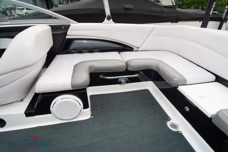 Slide: The Image of 2005 MasterCraft X45 boat interior with white and gray seating. - 17