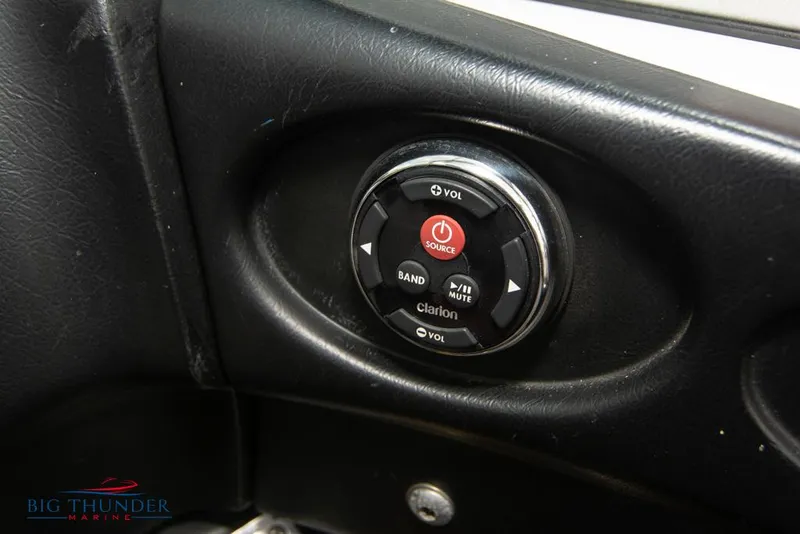 Slide: The Image of 2005 MasterCraft X45 boat dashboard with Clarion audio control. - 31