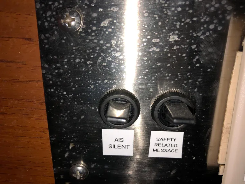 Slide: The Image of Control panel with AIS Silent and Safety Message switches on a 1978 Palmer Johnson New York 40 Sloop. - 8