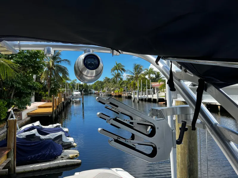Slide: The Image of View from a 2014 MasterCraft X-55 boat docked in a tropical canal. - 37