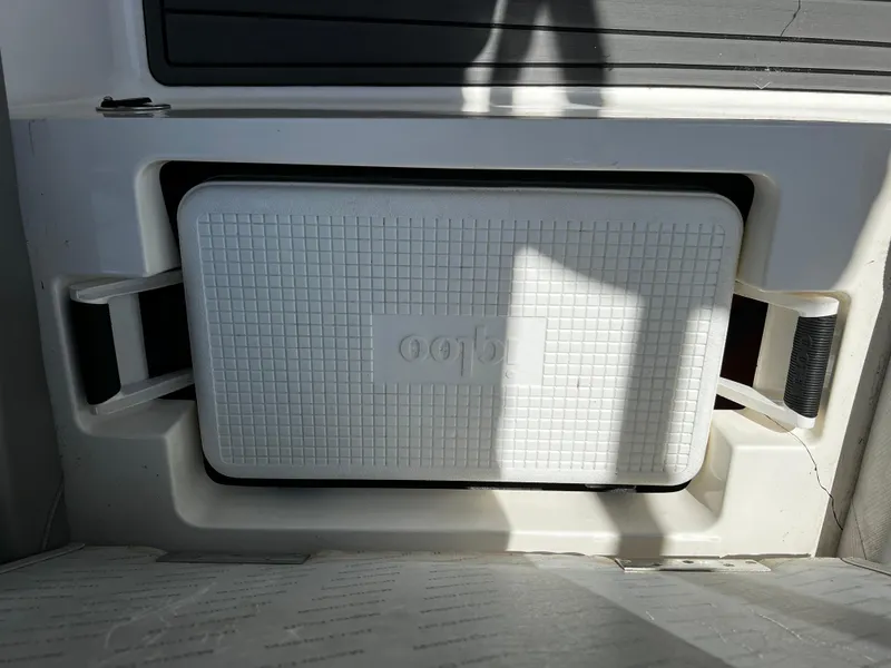 Slide: The Image of Built-in cooler compartment on a 2014 MasterCraft X-55 boat. - 42