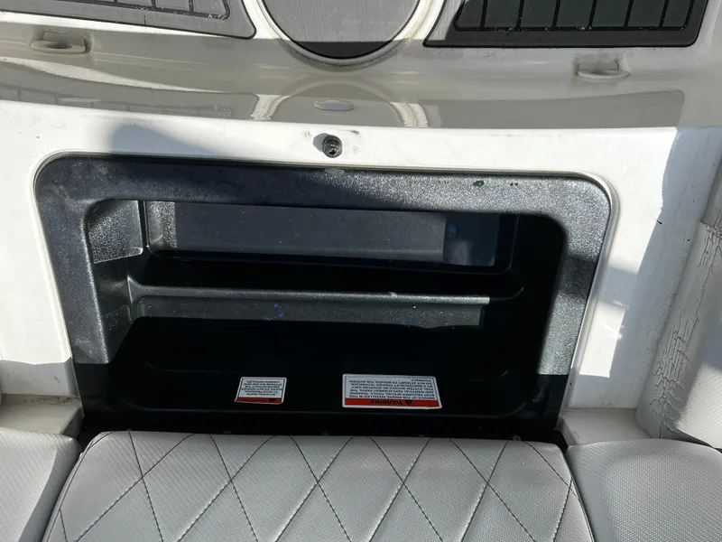 Slide: The Image of Storage compartment of a 2014 MasterCraft X-55 boat. - 44