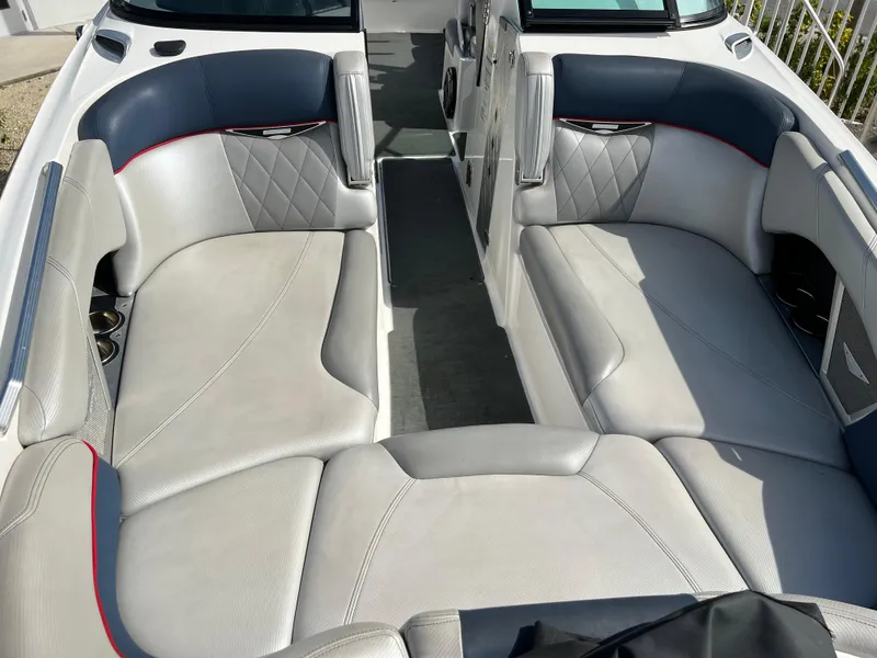 Slide: The Image of 2014 MasterCraft X-55 boat interior with luxurious seating and modern design. - 5