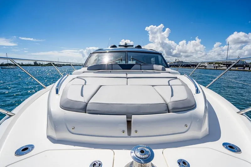 Slide: The Image of The 2020 Princess V60 features a sleek design with a spacious sun deck and modern interior. - 15
