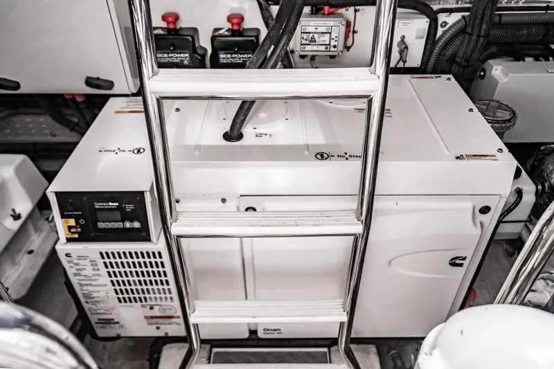 Slide: The Image of The engine room of the 2020 Princess V60 shows generators and technical equipment. - 30