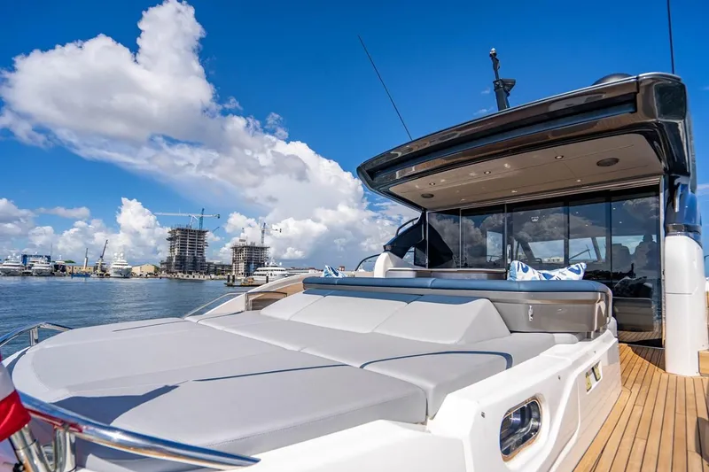 Slide: The Image of The 2020 Princess V60 features a sleek design with a spacious sun deck and modern interior. - 12