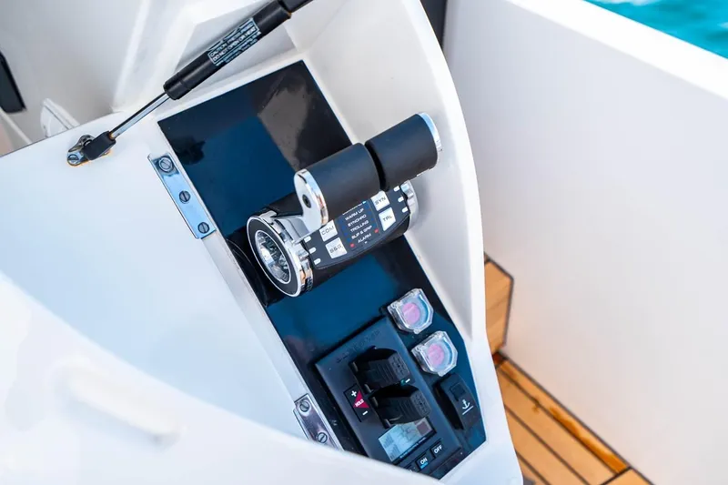 Slide: The Image of Close-up of the helm station on a 2020 Princess V60 with modern controls. - 18