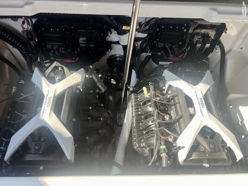 Slide: The Image of 2025 Yamaha Boats 252SE engine compartment with dual high-output engines. - 6