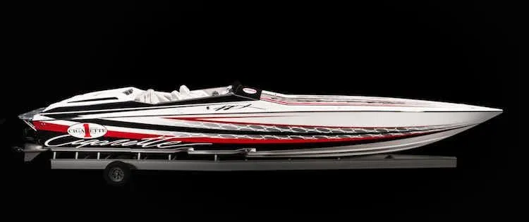 The Image of 2025 Cigarette 42' X speedboat with sleek design and vibrant graphics. - 0