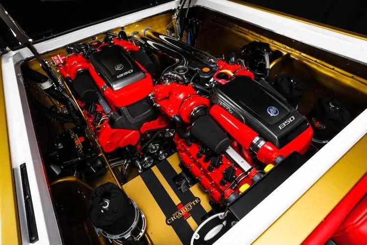 Slide: The Image of Cigarette 42' X 2025 model engine compartment with dual 1350 horsepower engines. - 12