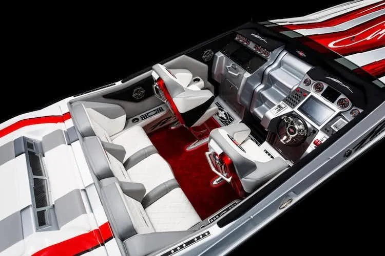 Slide: The Image of Interior of 2025 Cigarette 42' X boat with white and red seating, advanced dashboard. - 8