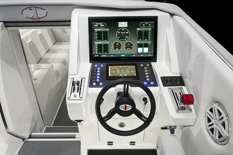 Slide: The Image of 2025 Cigarette 515 boat cockpit with advanced navigation system and modern controls. - 5
