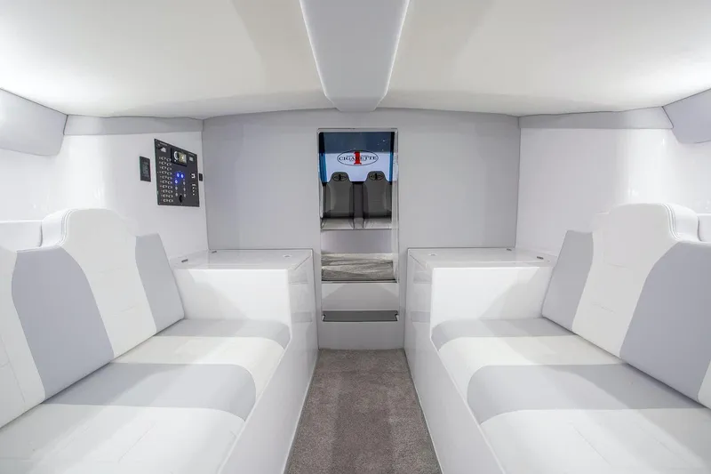 Slide: The Image of Interior of 2025 Cigarette 515 boat with modern white and gray seating. - 8