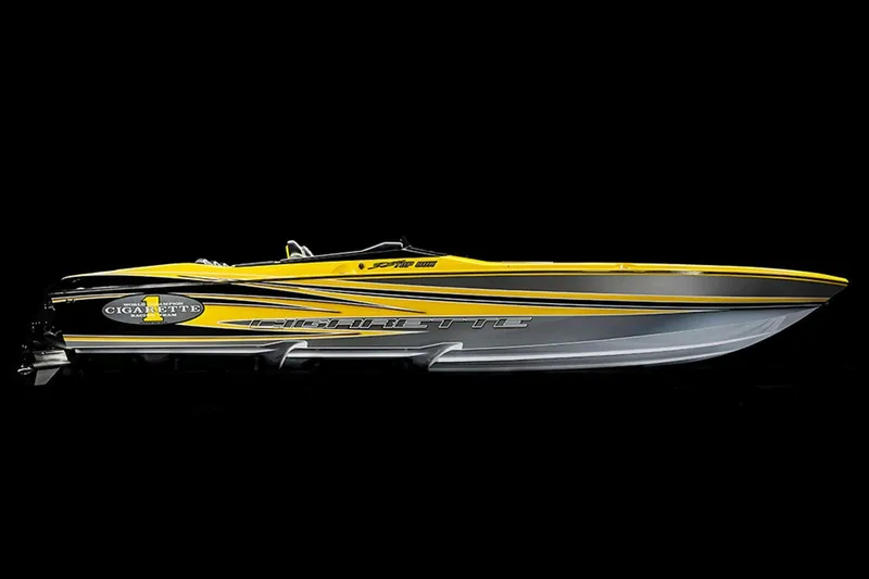 Slide: The Image of 2025 Cigarette 38 Top Gun speedboat with yellow and black design on black background. - 3