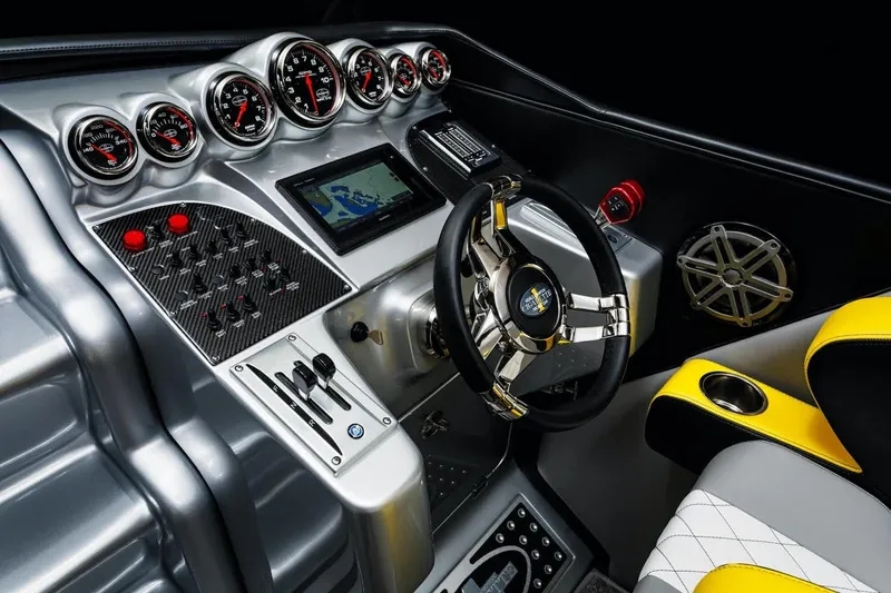 Slide: The Image of 2025 Cigarette 38 Top Gun boat dashboard with advanced controls and navigation system. - 7